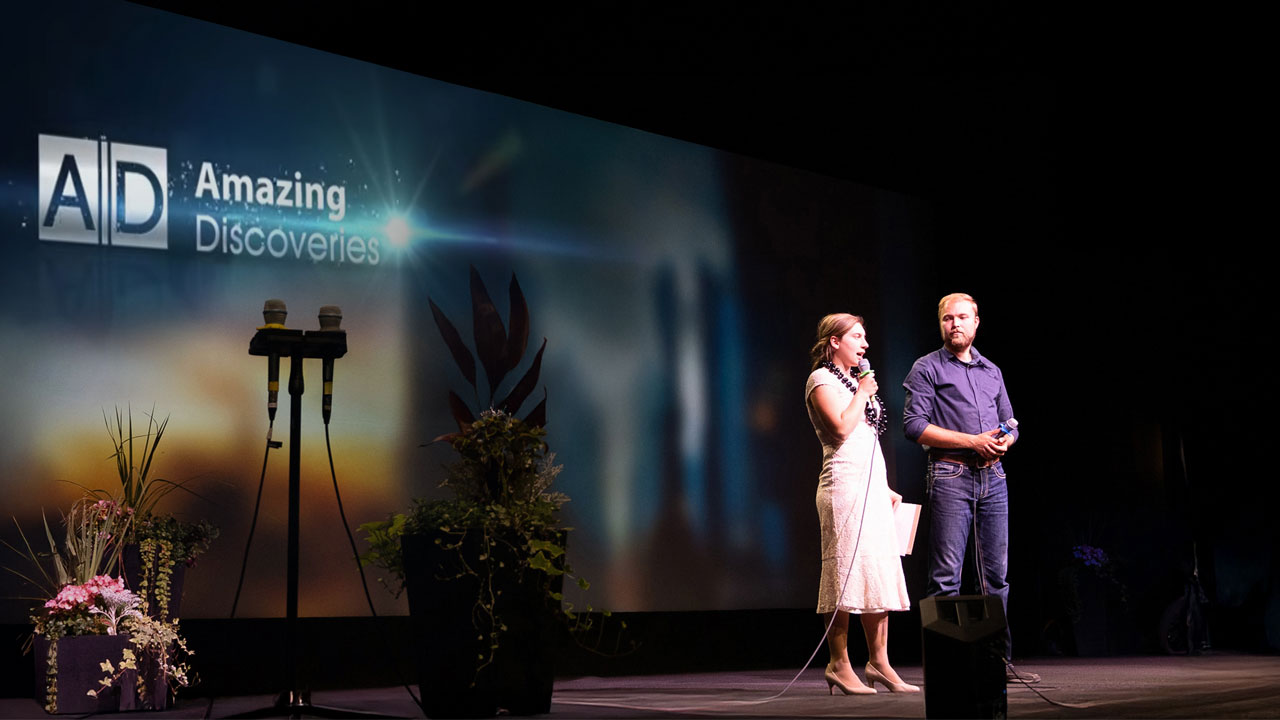 Image of preacher on stage